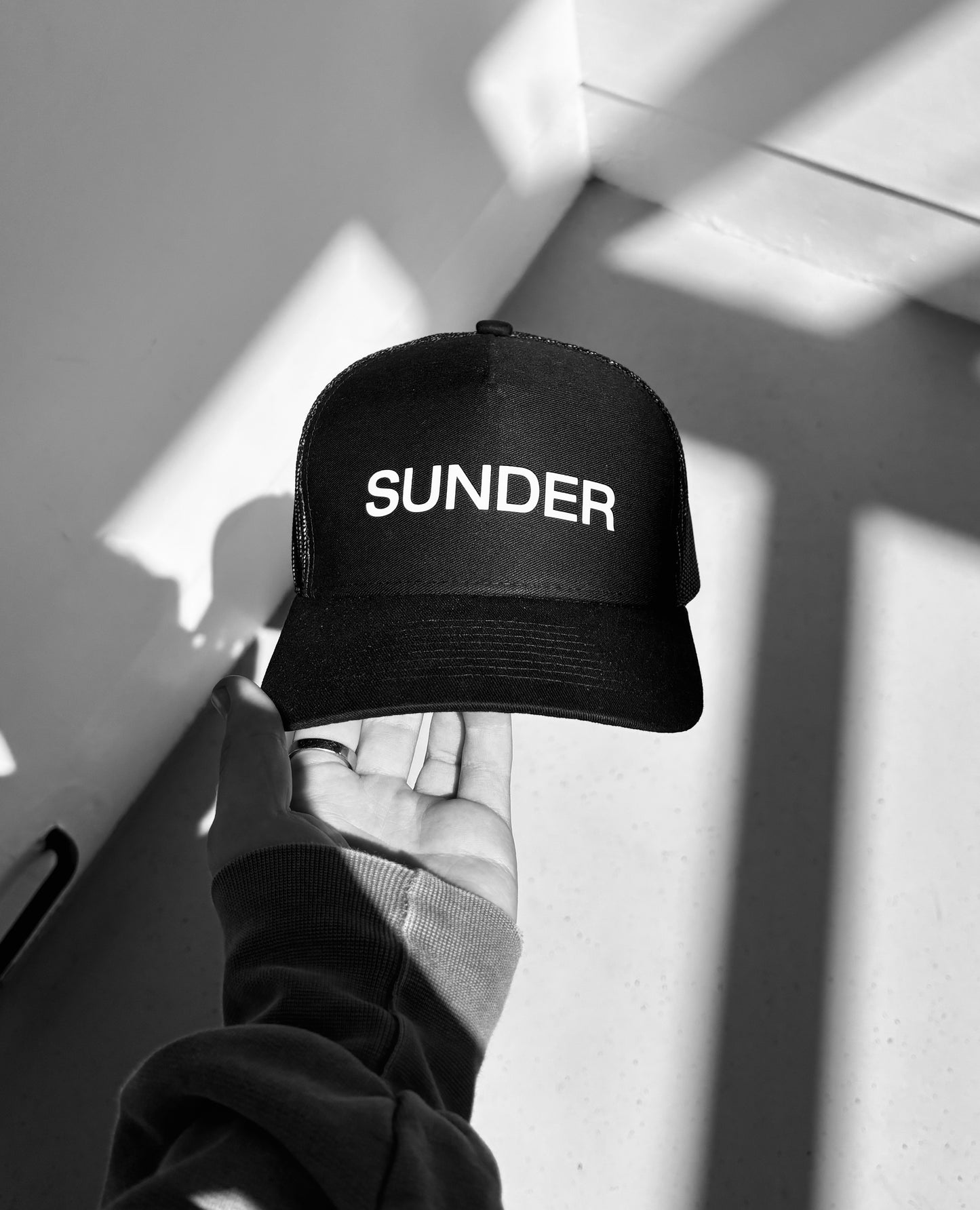 Sunder logo daily cap